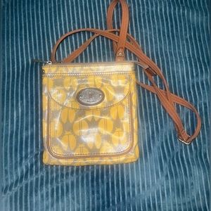 Fossil yellow lady bug purse